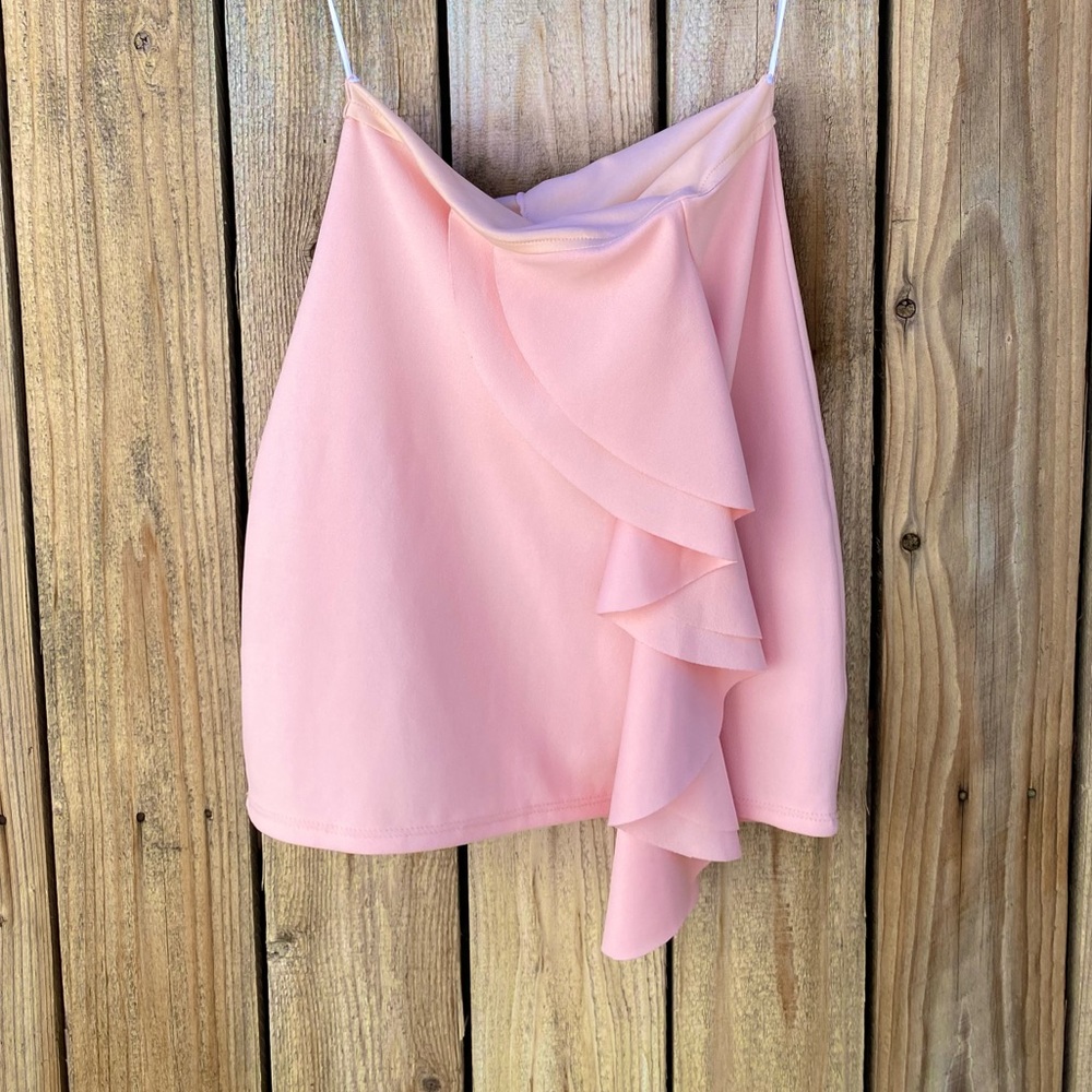 short pink skirt from the brand Candelaria colombia
